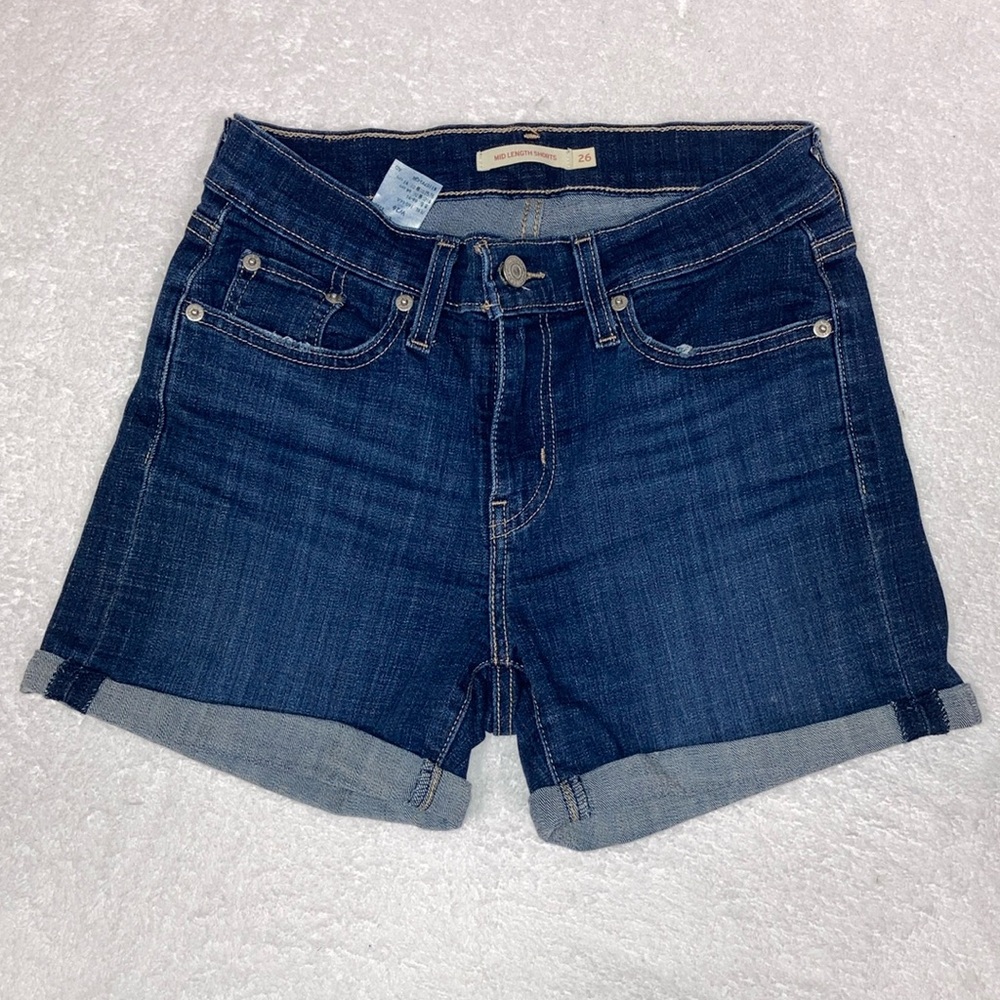 Levi’s mid length dark wash denim stretch roll cuff shorts size 26